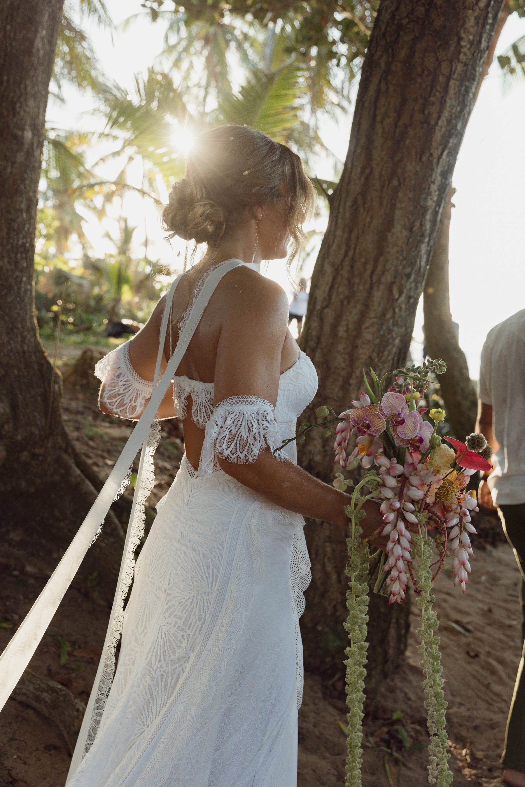 Bride enjoying a quiet moment in the tropical setting at Casa Isleña