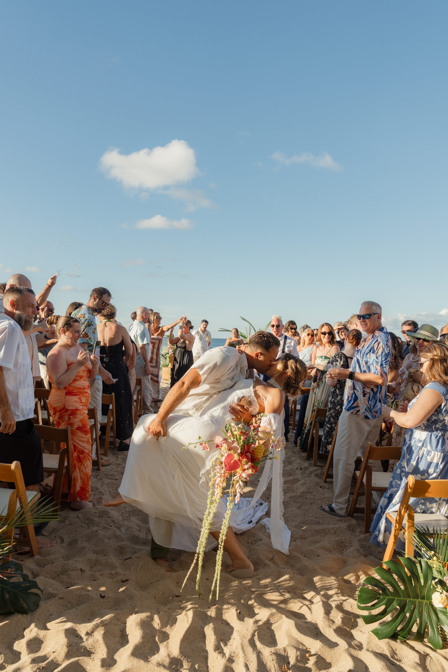 Amanda and Joe during their beachfront wedding ceremony in Rincón